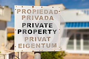 In the housing development in front of a house. A sign says Private Property.