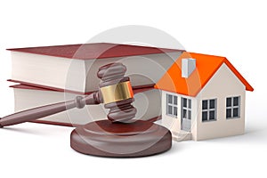 Housing legislation concept - law books, house and gavel