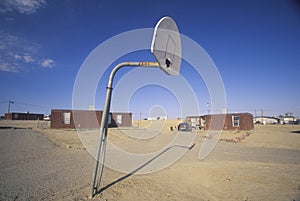 Housing project with basketball court on Navajo Indian Reservation in Shiprock, NM photo