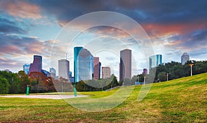 Houston skyline in sunny day from park grass of Texas USA