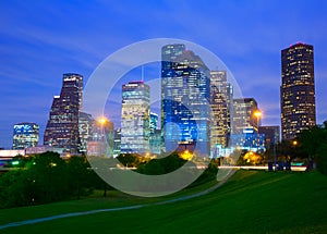 Houston Texas modern skyline at sunset twilight from park