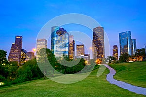 Houston Texas modern skyline at sunset twilight from park