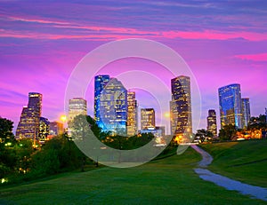 Houston Texas modern skyline at sunset twilight from park