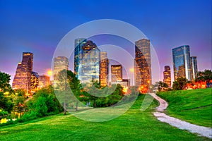 Houston Texas modern skyline at sunset twilight on park