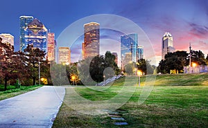 Houston Texas Skyline with modern skyscrapers and blue sky view from park river US