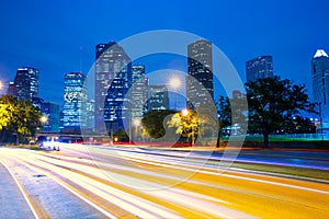 Houston Texas skyline at sunset with traffic lights