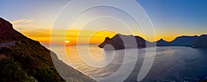 Hout Bay coastal mountain landscape at sunset in Cape Town