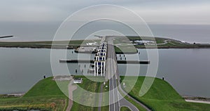 Houtrib sluices along the dike and road between Lelystad towards Enkhuizen. Dutch infrastructure along the water