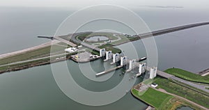 Houtrib sluices along the dike and road between Lelystad towards Enkhuizen. Dutch infrastructure along the water