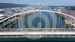 Hover above Willamette River in front of Fremont Bridge