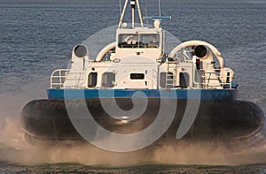 Hovercraft on blue sea photo
