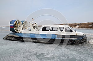Hovercraft, vessel for for movement on the ice, on the dock in Large Goloustnoye Village