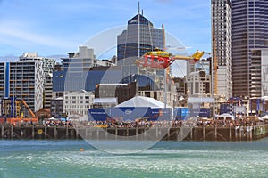 Helicopter carrying out a simulated water rescue, Auckland, New Zealand