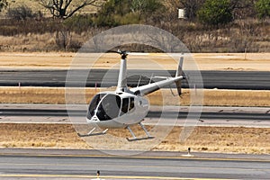 Hovering Robinson R66 Helicopter