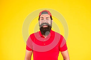 How can I help you. Supermarket staff wanted. Man bearded hipster with mustache wear uniform yellow background. Shop