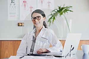 How can I help you today. Cropped portrait of a young female doctor working in her office in the hospital.