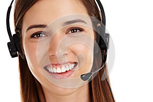 How can I help you today. Studio shot of a beautiful young customer service agent wearing a headset against a white