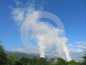 How clouds are made with polluting smoke from industry chimneys