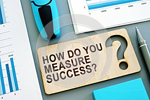 How do you measure success written sign and business report.
