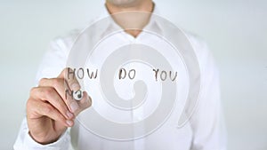 How Do You Motivate your Team, Businessman Writing on Glass