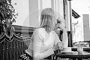 How enjoy being single tips. Woman lonely wait date. Dating advice for women. Still waiting him. Woman sits alone cafe
