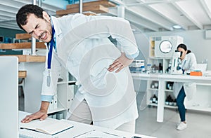 How long have I been at this case. a young scientist experiencing back pain while working in a lab.