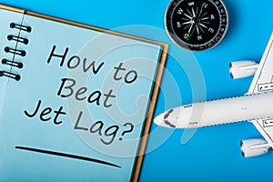 How to beat Jet Lag - Stop Jet Lag symbol with airplane and compas. Business travel concept