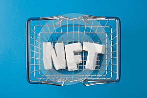 How to buy nft token. The concept of buying an NFT token in a shopping cart.