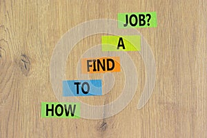How to find a job symbol. Concept words How to find a job on color papers on a beautiful wooden background. Business and how to