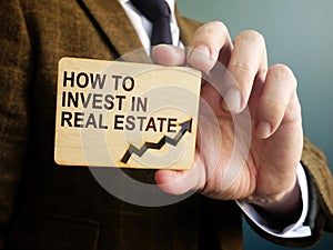 How to Invest in Real Estate typed phrase on the plate photo