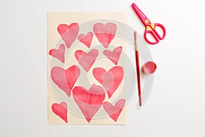 How to make cute paper heart for Valentines day. Children art project. Step by step photo instruction. Step 5. Cut out hearts with