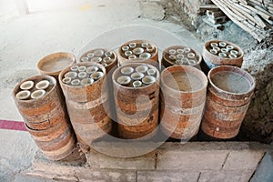 Saggar or Jock is a container of Chicken bowls for protecting flame and ashes from fuel during firing in the kiln. photo