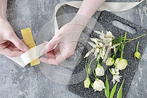 How to make wrist corsage for bride using rose and eustoma flowers