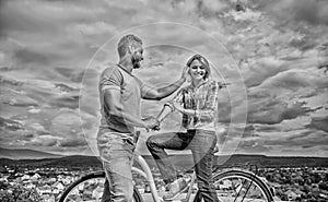 How to meet girls while riding bike. Man with beard and shy blonde lady on first date. Picking up girl. Couple just meet