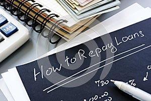 How to repay loans sign. Repayment concept photo