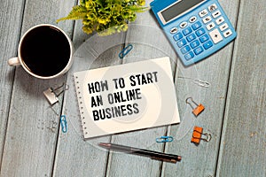 How to start an online business text on a blackboard