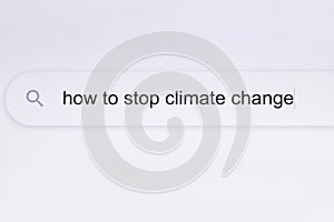 How to stop climate change - pc screen internet browser search engine bar typing environment related question. Searching