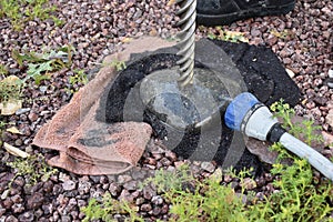 How to Wet Drill a Hole in a River Rock in Arizona Backyard