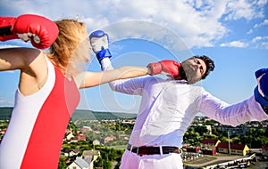 How to win her back effective tips. Let her win concept. Couple boxing gloves fight sky background. Girl confident