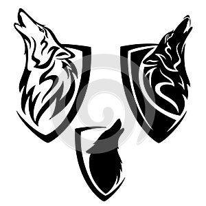 Howling wolf head in simple heraldic shield black and white vector emblem