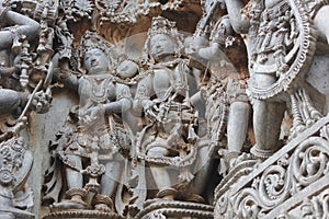 Hoysaleswara Temple Wall carved with Sculpture of Female dancer and male musician