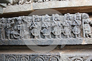 Hoysaleswara Temple wall carving of demons marching for fight war