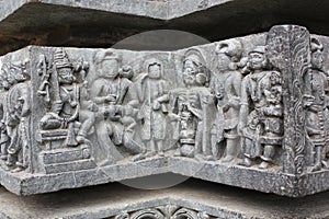 Hoysaleswara Temple wall carving of God and Devotees