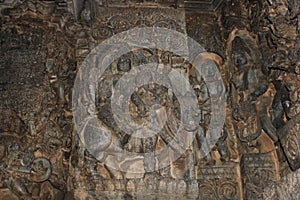 Hoysaleswara Temple wall carving of Uma Maheswara lord shiva and parvati photo