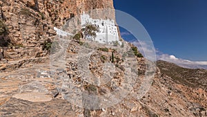 The Hozoviotissa Monastery standing on a rock over the Aegean sea in Amorgos island timelapse hyperlapse, Greece.