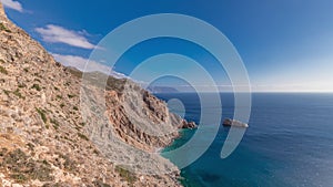 The Hozoviotissa Monastery standing on a rock over the Aegean sea in Amorgos island timelapse hyperlapse, Greece.