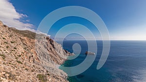 The Hozoviotissa Monastery standing on a rock over the Aegean sea in Amorgos island timelapse hyperlapse, Greece.