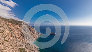 The Hozoviotissa Monastery standing on a rock over the Aegean sea in Amorgos island timelapse hyperlapse, Greece.