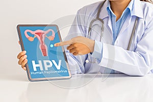 HPV Human Papillomavirus Female doctor explaining knowledge and pointed out women health problems on tablet screen, viruses Some