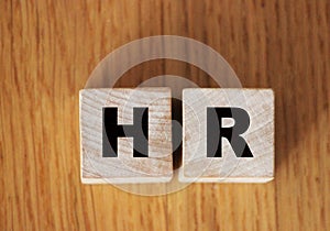 HR abbreviation on wooden blocks. Human Resources career business concept